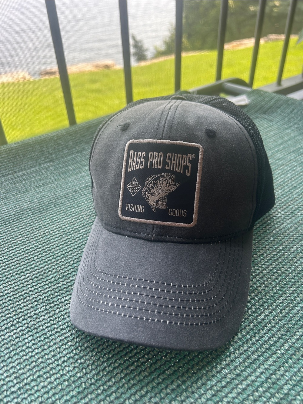 Bass Pro Shops Black and Cream Embroidered Fishing Patch Trucker Hat